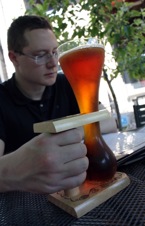 Gigantic man paws with the fancy kwak glass. Justin always looks miserable during our patio dining shots, but I assure you he was enjoying himself.